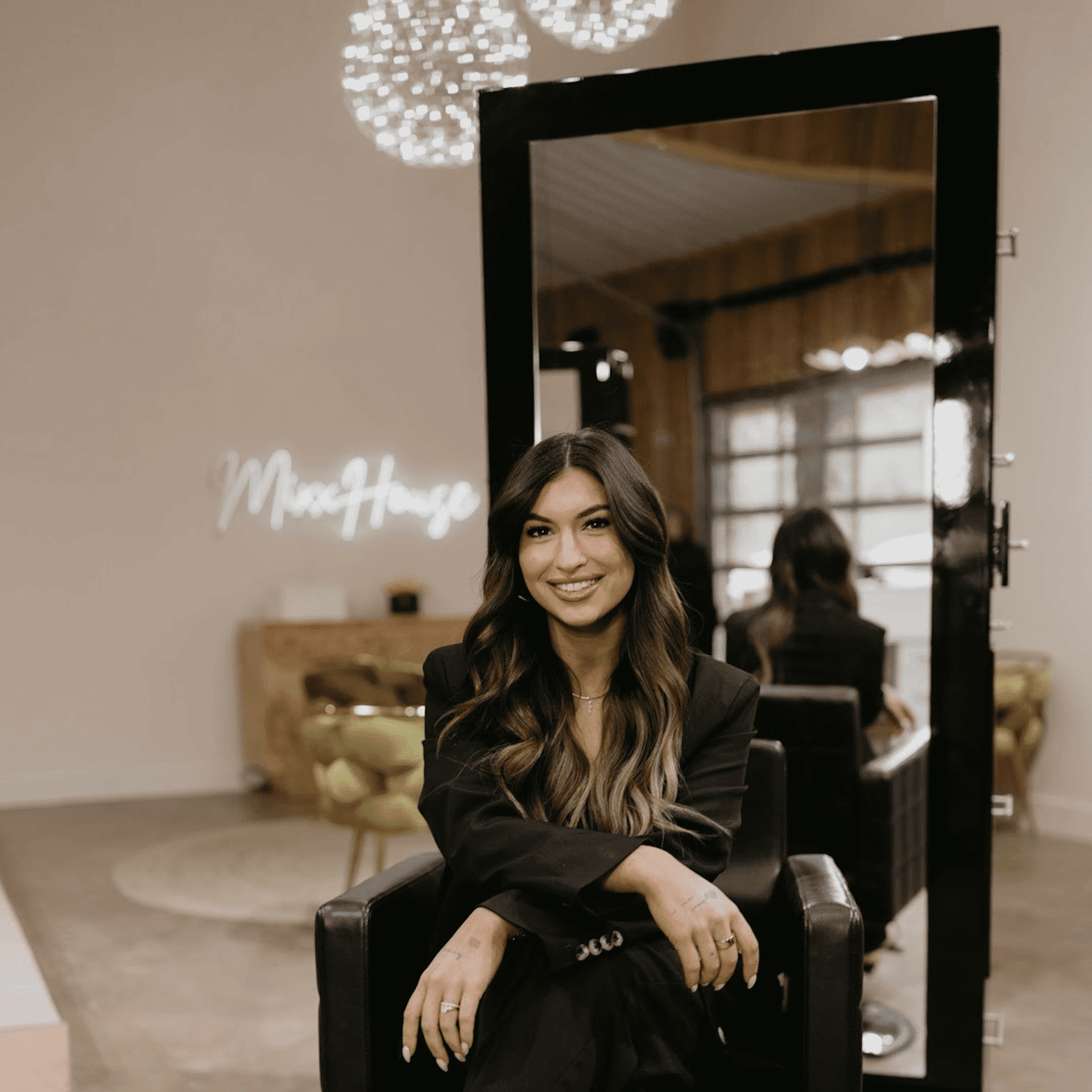 Portrait of Cicely, a professional stylist at MixxHouse Salon, showcasing their expertise and style.