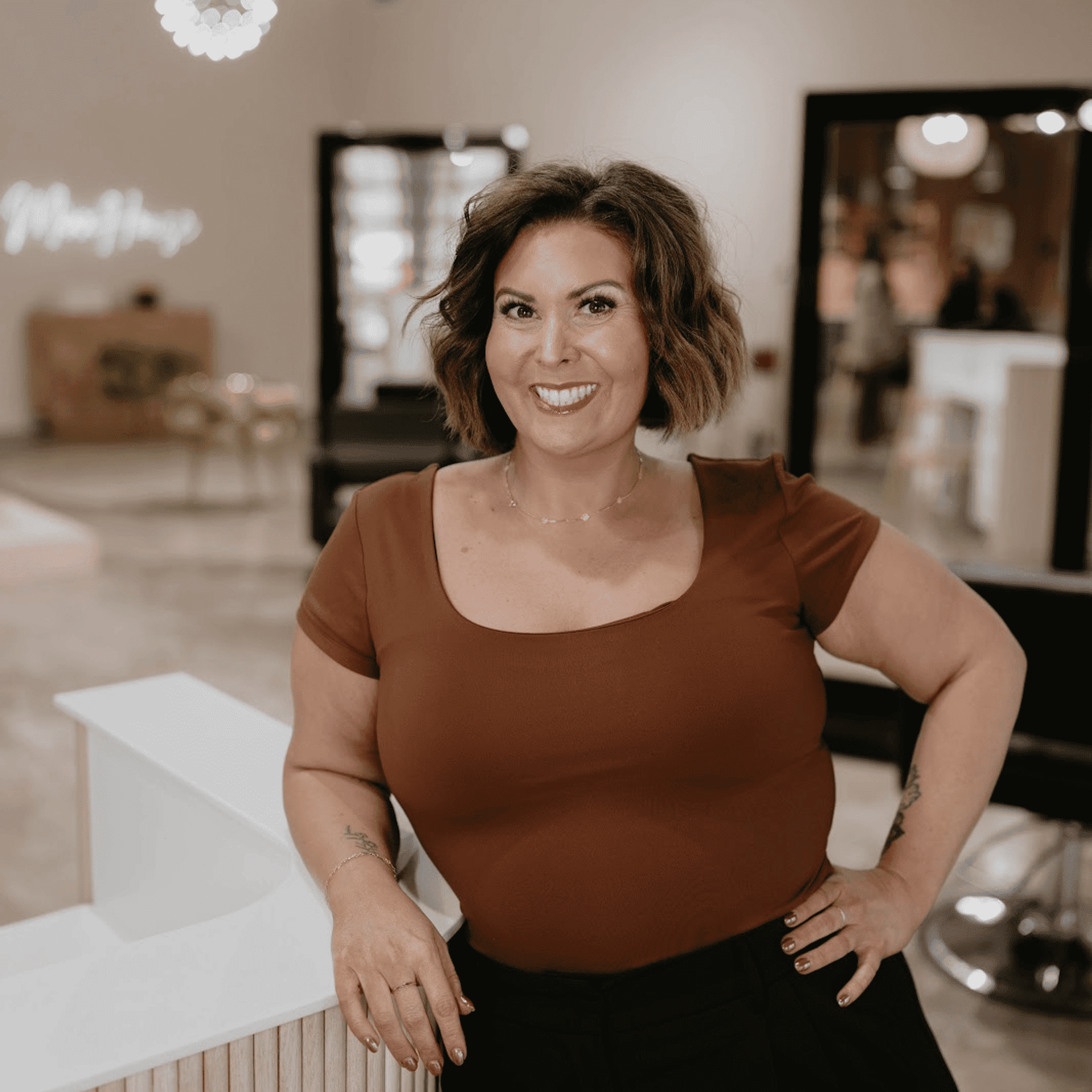 Portrait of Jen, a professional stylist at MixxHouse Salon, showcasing their expertise and style.