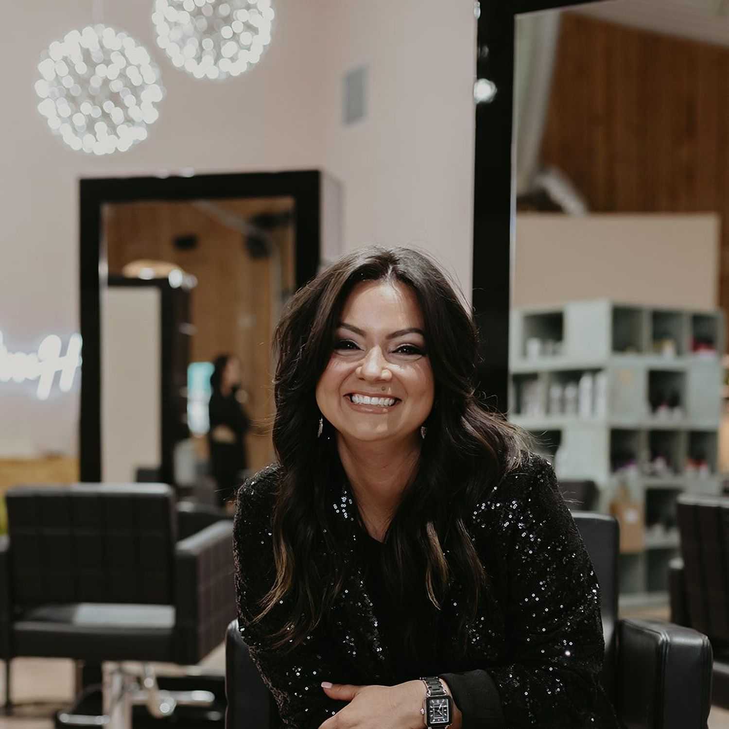 Portrait of Angie, a professional stylist at MixxHouse Salon, showcasing their expertise and style.