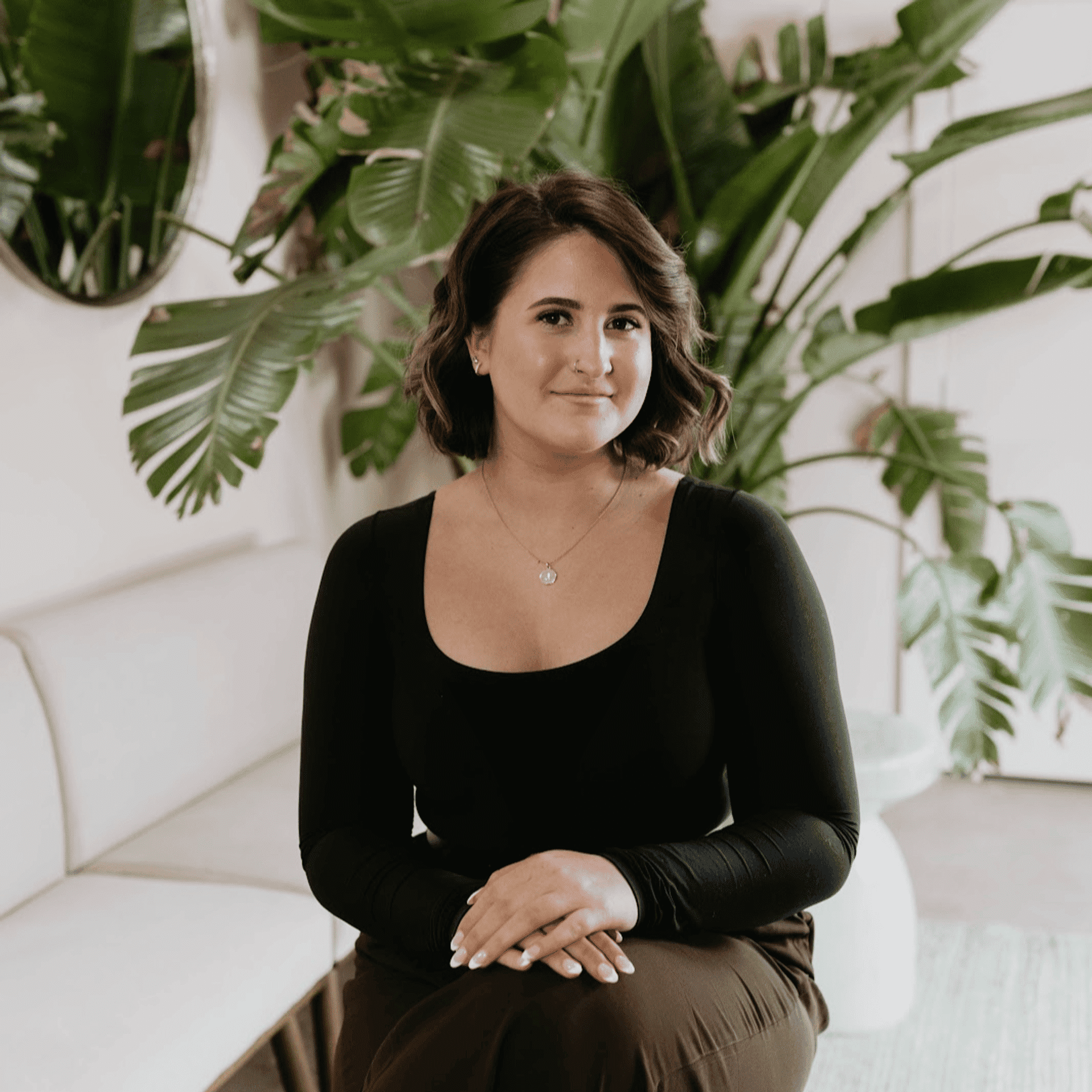 Portrait of Jadyn, a professional stylist at MixxHouse Salon, showcasing their expertise and style.