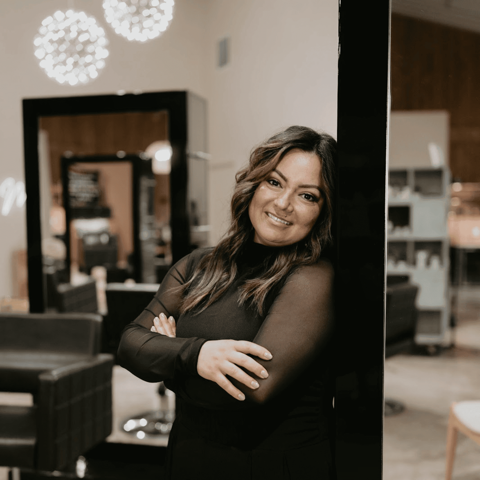 Portrait of Angie, a professional stylist at MixxHouse Salon, showcasing their expertise and style.